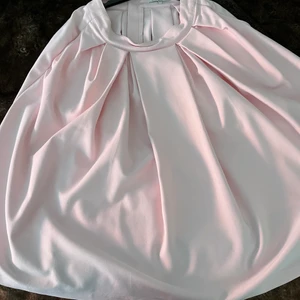  Xs  - Ny helt oanvänd, rosa kjol 