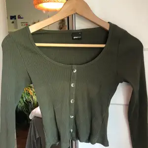 Vanlig grön tröja från Gina trico som inte används