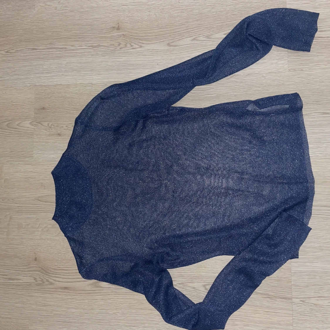 Glittrig meshtröja - 90