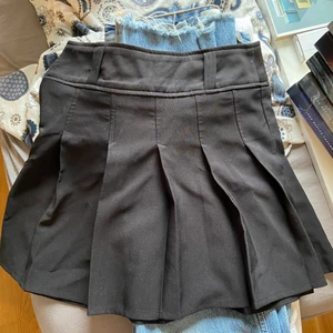 Svart tenniskjol - Svart tenniskjol från Shein. Oanvänd. Frakt ingår i priset