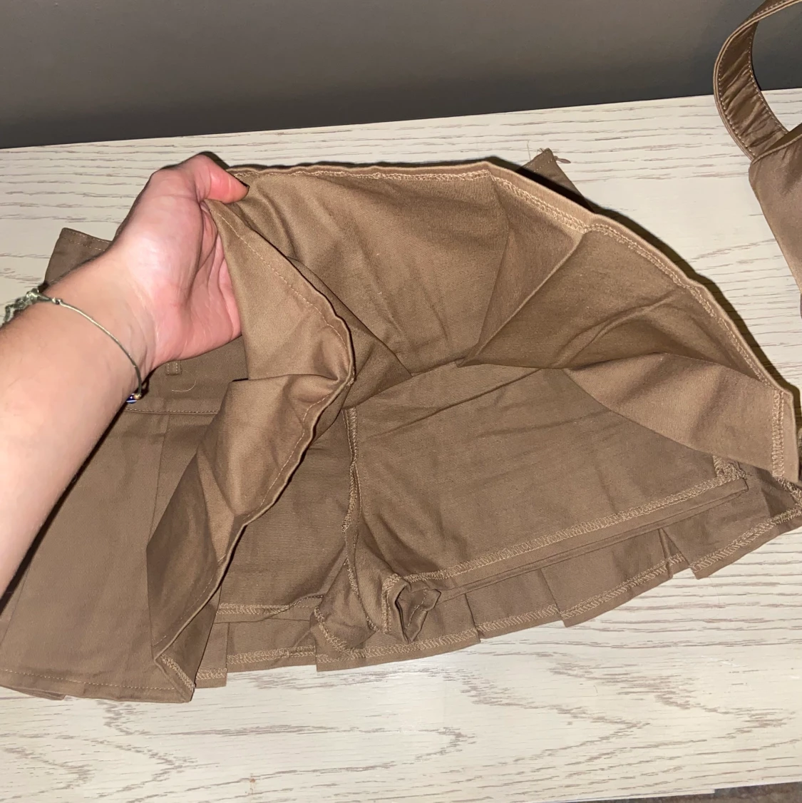 Veckad minikjol brun - 90