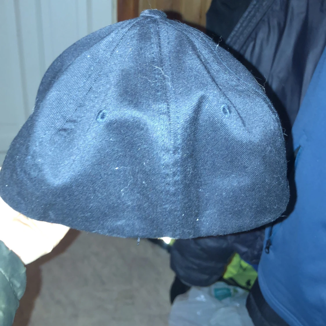 En keps av ett företag  - 91