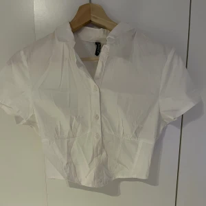 Vit korsett T-shirt  - Har använt två gånger, och är i bra skick