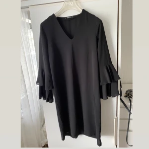 Klänning  - Klänning i storlek 34