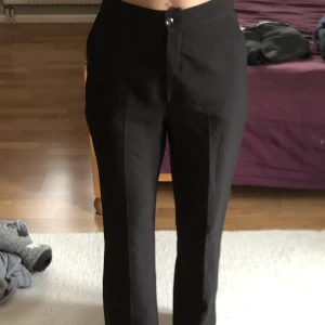 Svarta kostymbyxor  - Aldrig använda 