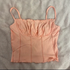 Rosa topp - En rosa topp, aldrig använd. 