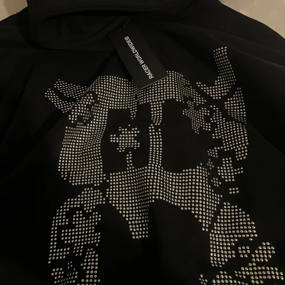Metallic studded silver logo on the front and hood oversized fit, will last you forever. 10/10 never worn  text me for additional info or bidding . Hoodies.