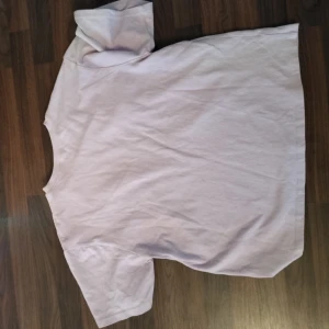 Pastel pink - The secret of this shirt is that is has a built in boob holder. Dont tell anyone