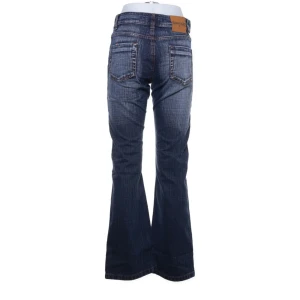 John F. Gee - Vintage Jeans,43 blå lågmidjade bootcut. Köpta för runt 1000 kr och använda en gång :)