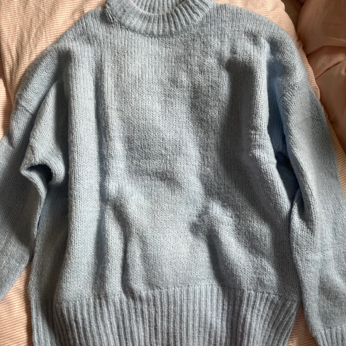 Stickad tröja