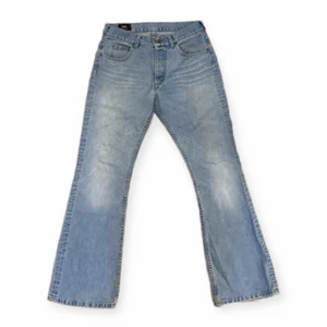 Lee bootcut jeans - Bootcut jeans från Lee i ljusblåfärg med wash. Storlek 32-32. Good quality denim.