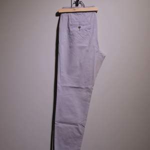 Light grey summer trousers from H&M. In good condition. 