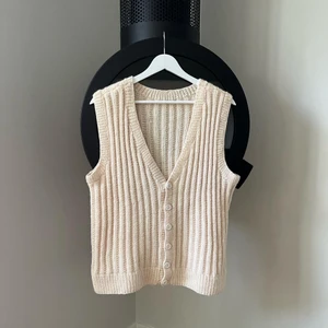 Vintage stickad väst - Stickad vintageväst - fint skick - passar storlek S-M - pris: 149