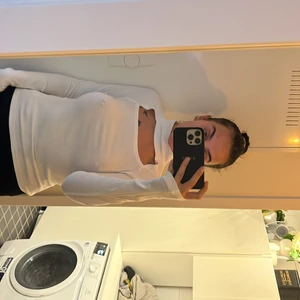 Polo med utskärning  - Köpt på Gina, använd 1 gång 