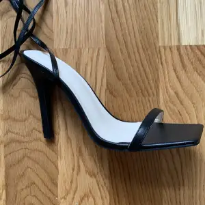Black heels with straps, very comfortable to walk in