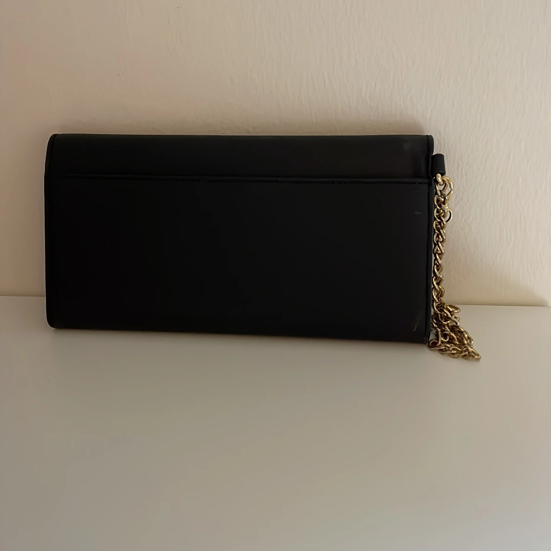 Väska i svart och guld - 91