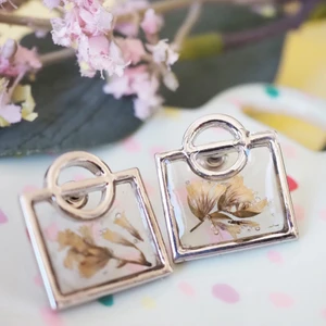 White flower stud earrings  - I collected this super cute flower during summer - spring 2021 in Sweden. I carefully pressed on wooden flower press for a week. I colored dried flowers with alcohol inks. Then I gently embed them with uv-resin. 