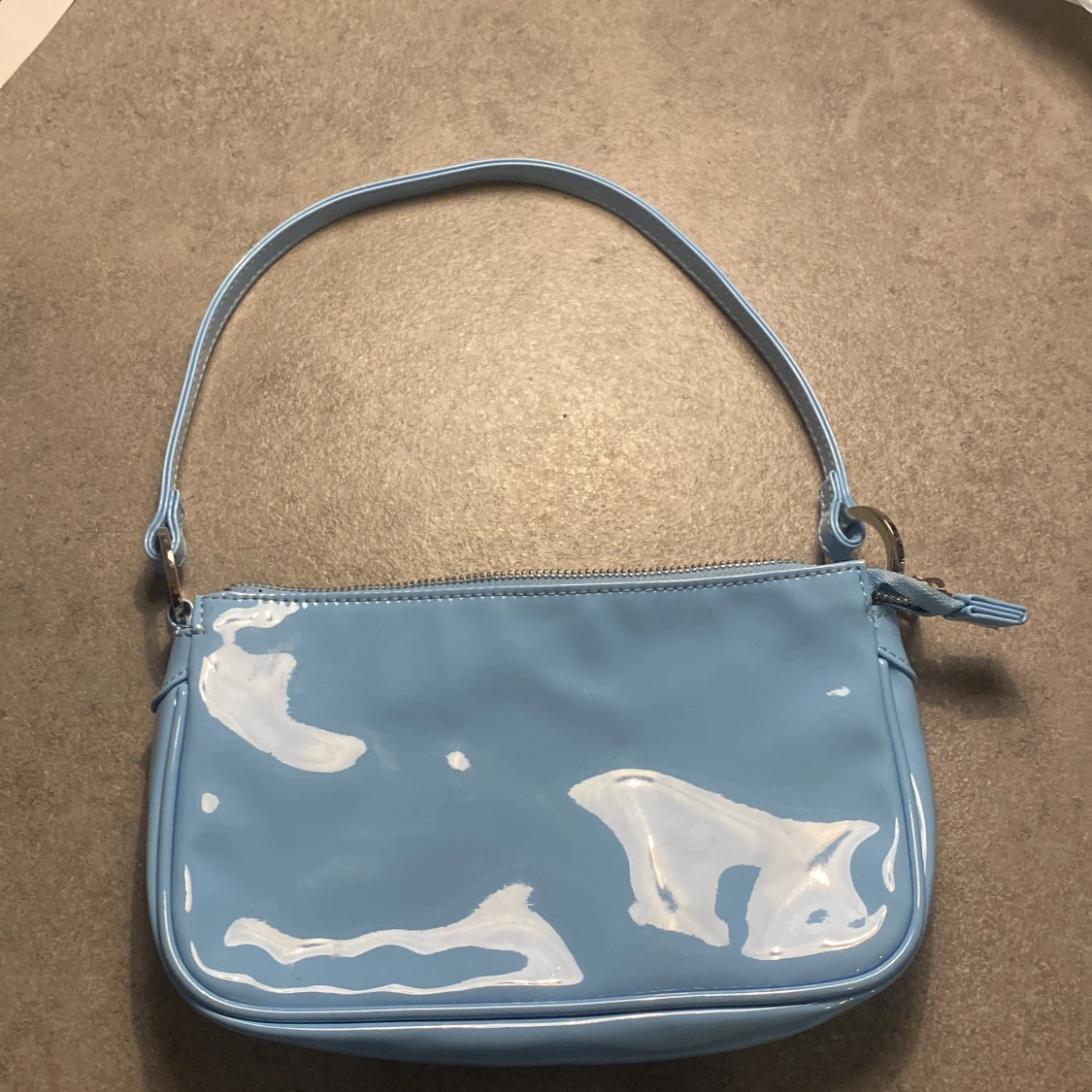 Ljusblå väska 