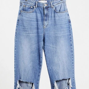 Slitna wide leg jeans - Använda och lite slitna 