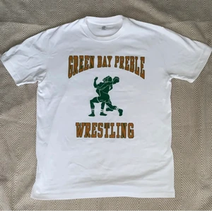 Vintage t shirt vit - En vit vintage tröja med green bay tryck storlek M