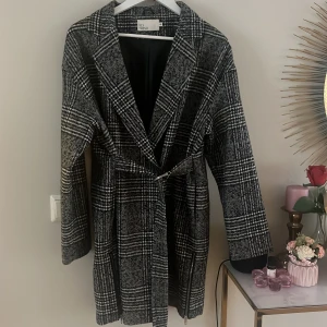 Kappa - En rutig kappa från NLY trend 