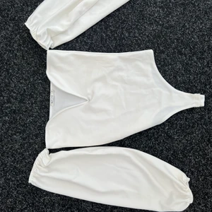 Topp nelly - En body, offshoulder topp från Nelly, stl s