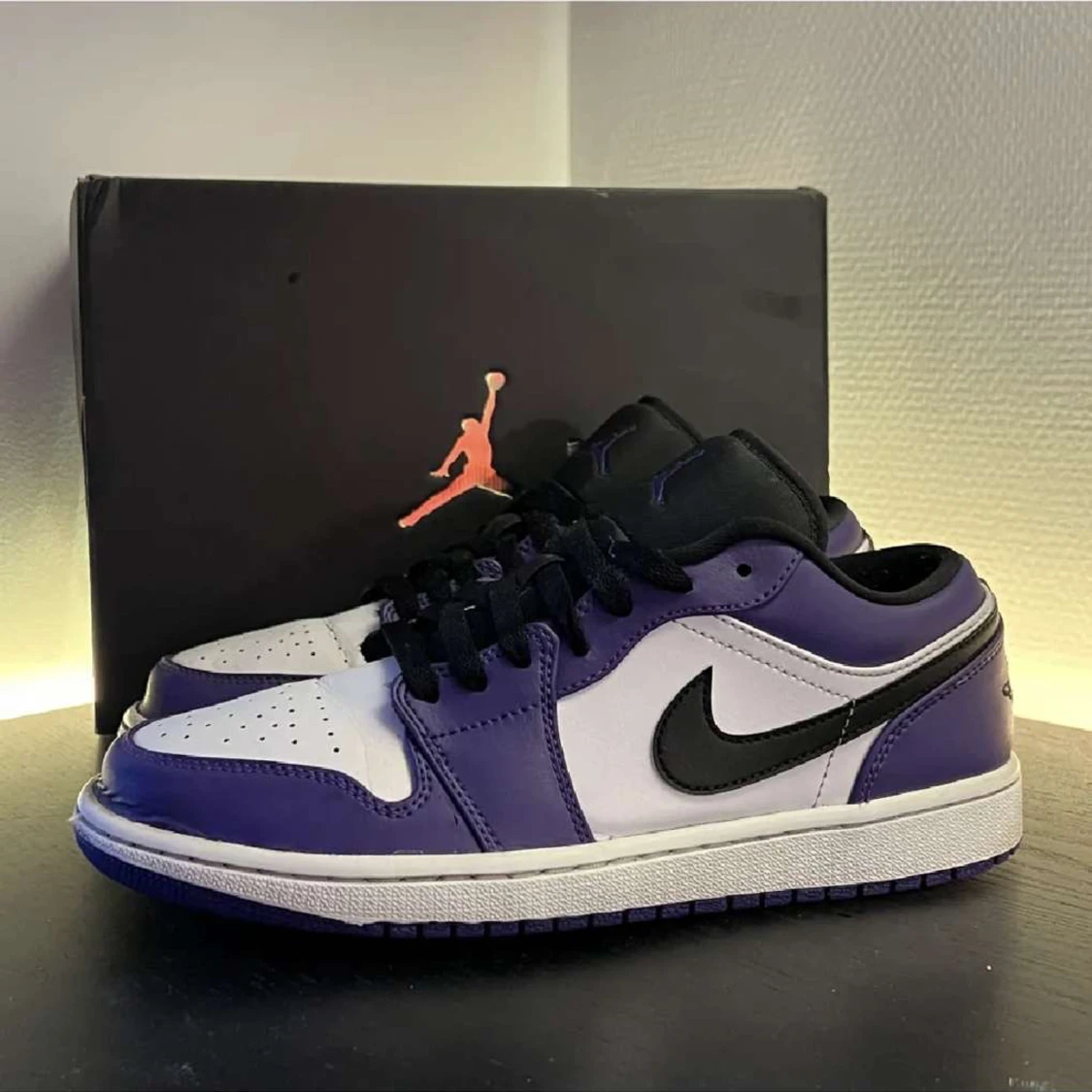 Jordan 1s low court purple
