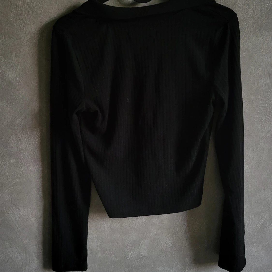 Svart långärmad topp från Sinsay - 90