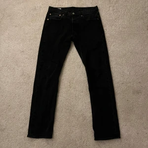 Levis 501 - svarta Levis 501 jeans. Storlek W31 L32