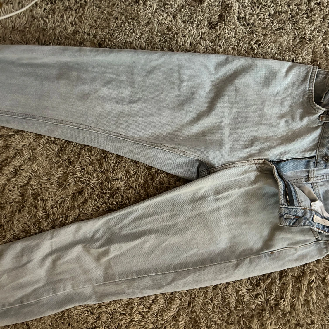 Ljusblå jeans från Grunt - 90