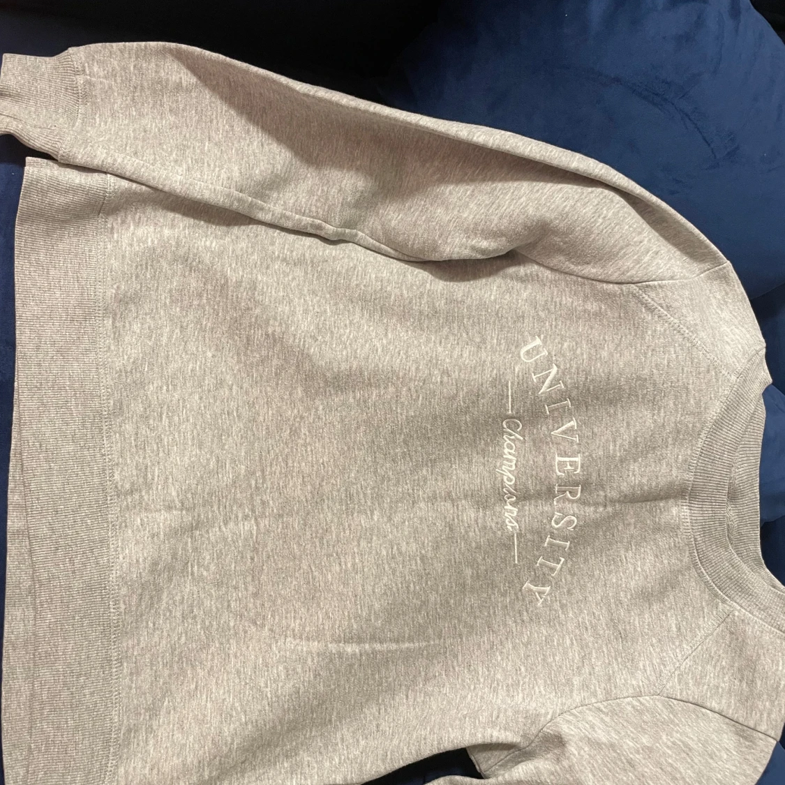 Grå sweatshirt från Gina Tricot