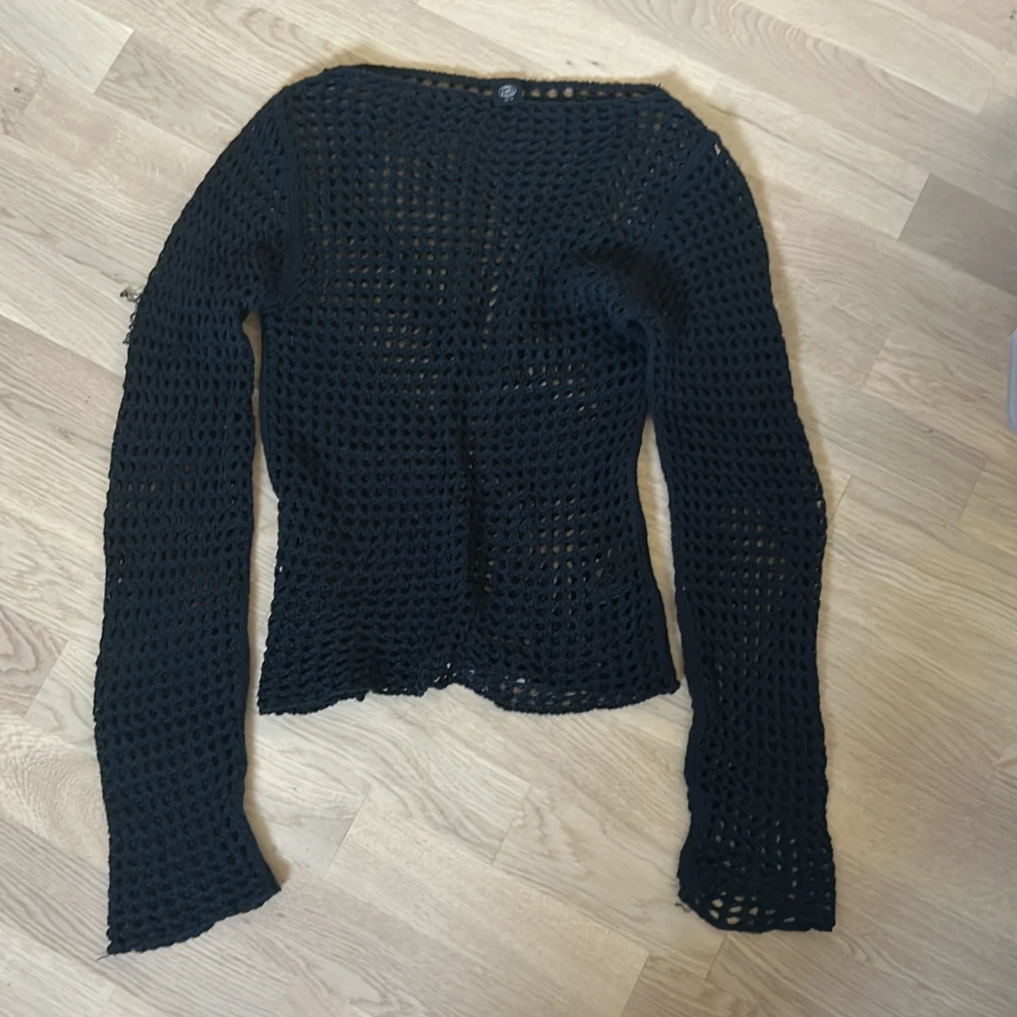 Svart stickad tröja från Obey