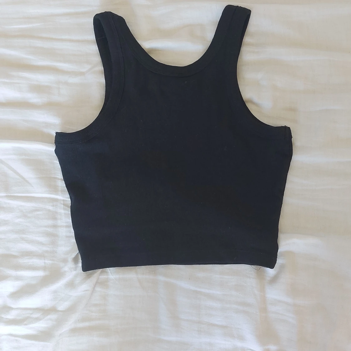 Svart croppad linnetopp från 157 - 90