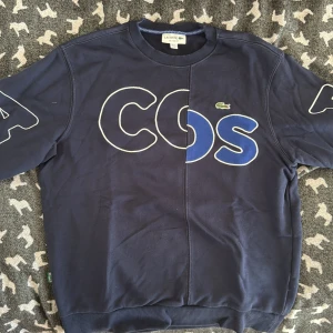Lacoste Sweatshirt - Blue Lacoste sweatshirt with a relaxed fit. No tags/used.