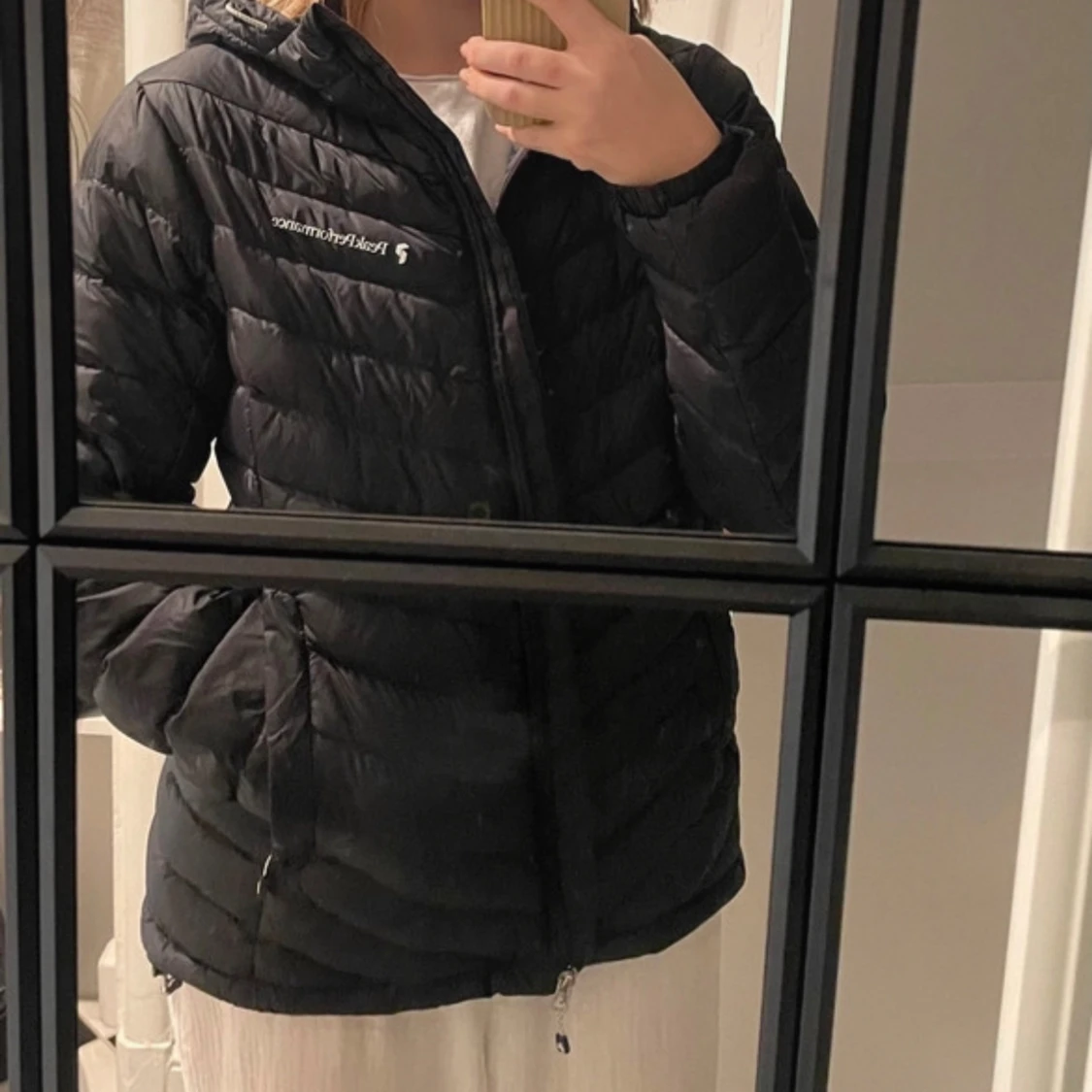 Svart dunjacka från Peak Performance - 91