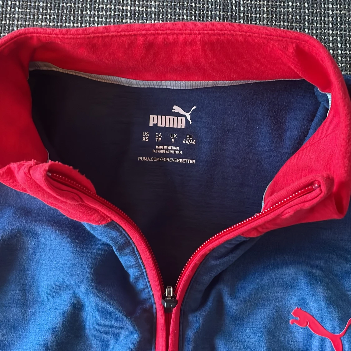 Röd och blå väst från Puma - 90
