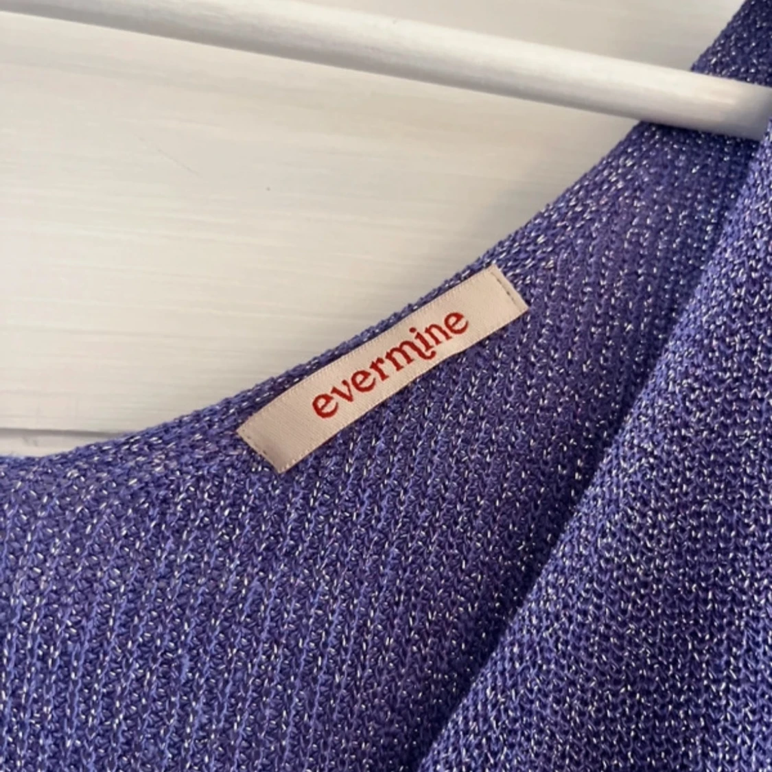 Lila glittrig linnetopp från Evermine - 90