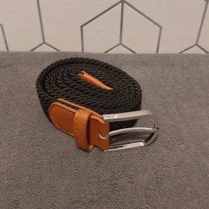 Flätat Bälte I Svart  - Helt nytt. Storlek 105 cm