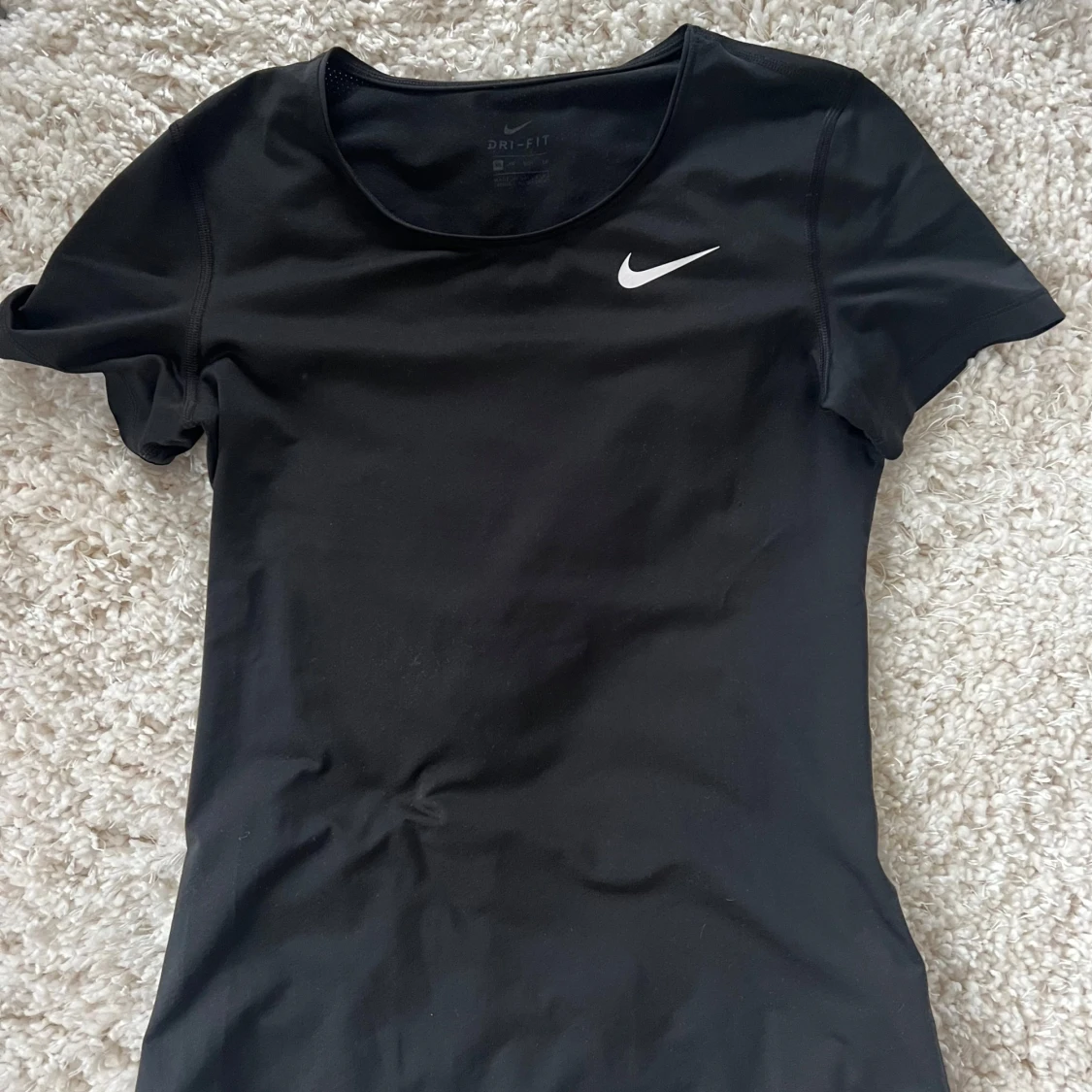 Svart Dri-Fit topp från Nike