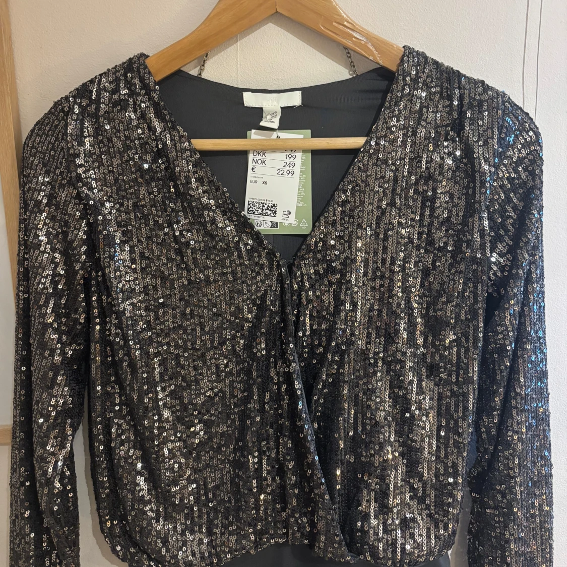 Mörk grå glittrig body från H&M - 1