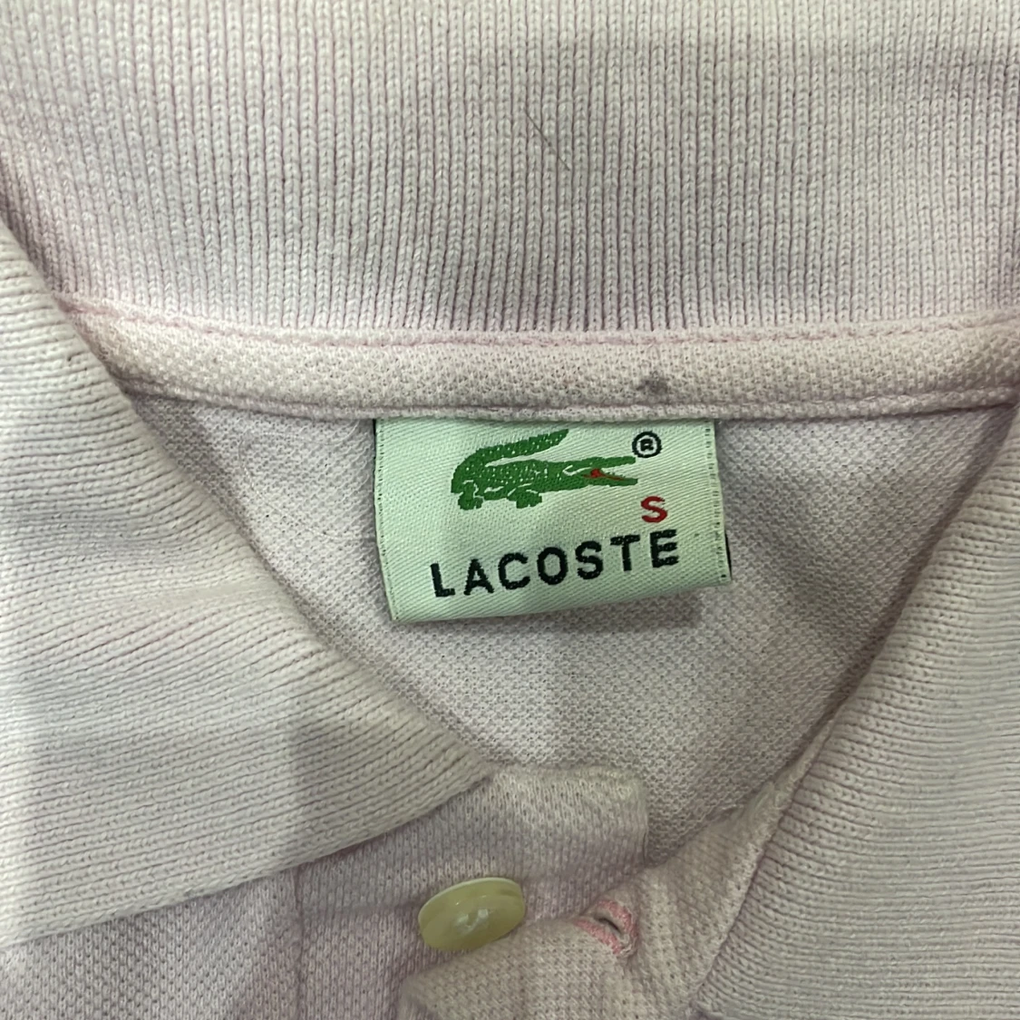 Ljusrosa pikétröja från Lacoste - 3