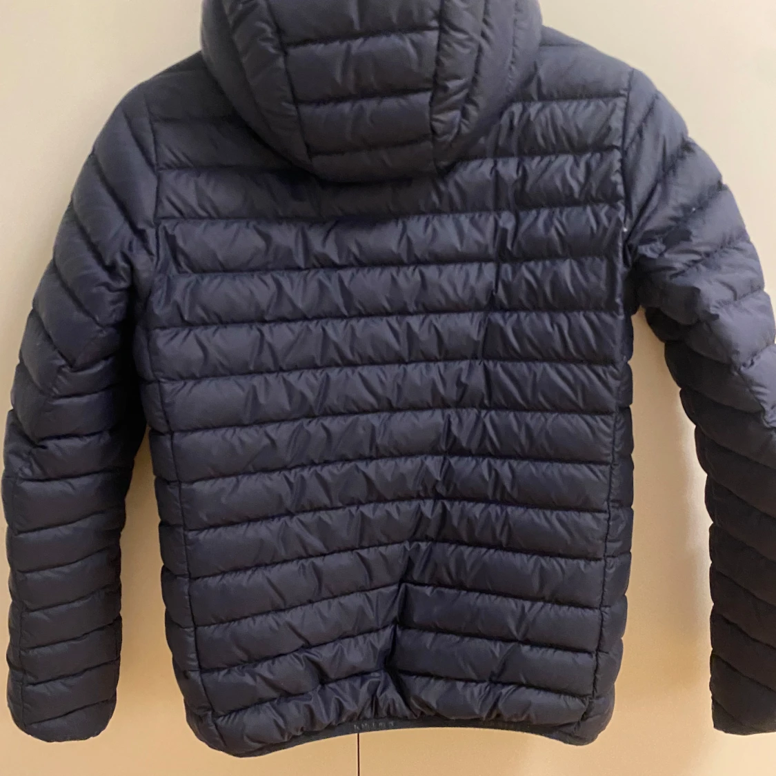 Mörkblå dunjacka från Peak Performance - 90