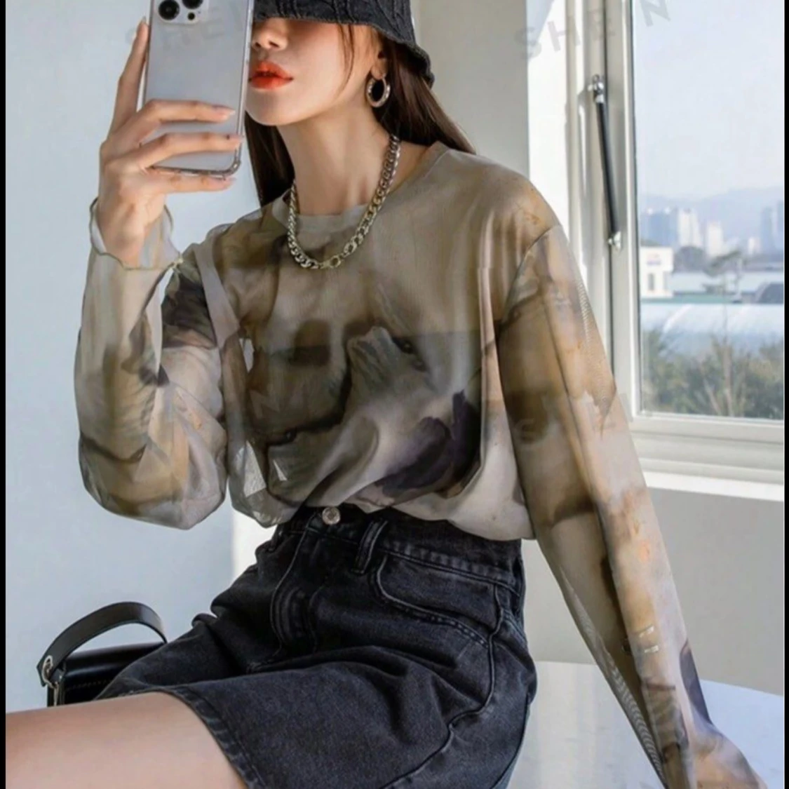 Transparent mönstrad tröja