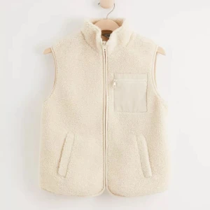 Ullväst - Superfin ullväst från Lindex, köpt våren 2022. I bra skick, lite nopprig på insidan men inget som syns(skriv för bilder). Storlek 170 och är som XS men passar även på mig som är S/M Priset kan diskuteras!!💕💕