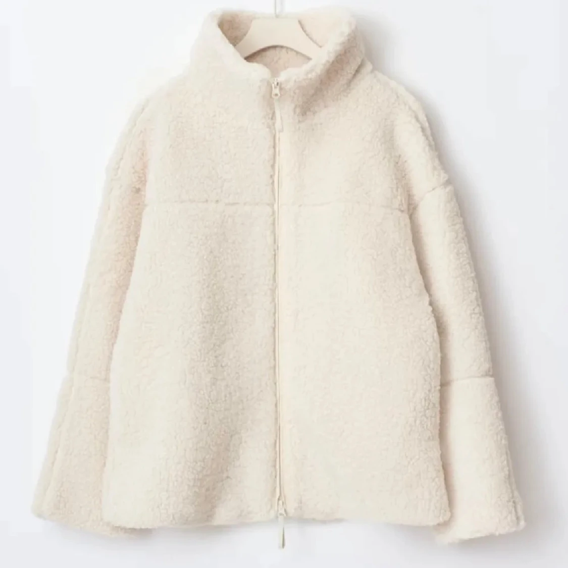 Beige teddyjacka med dragkedja