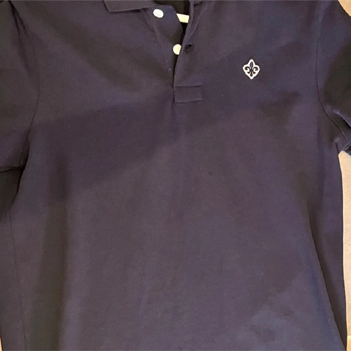 Mörkblå pikétröja från Morris