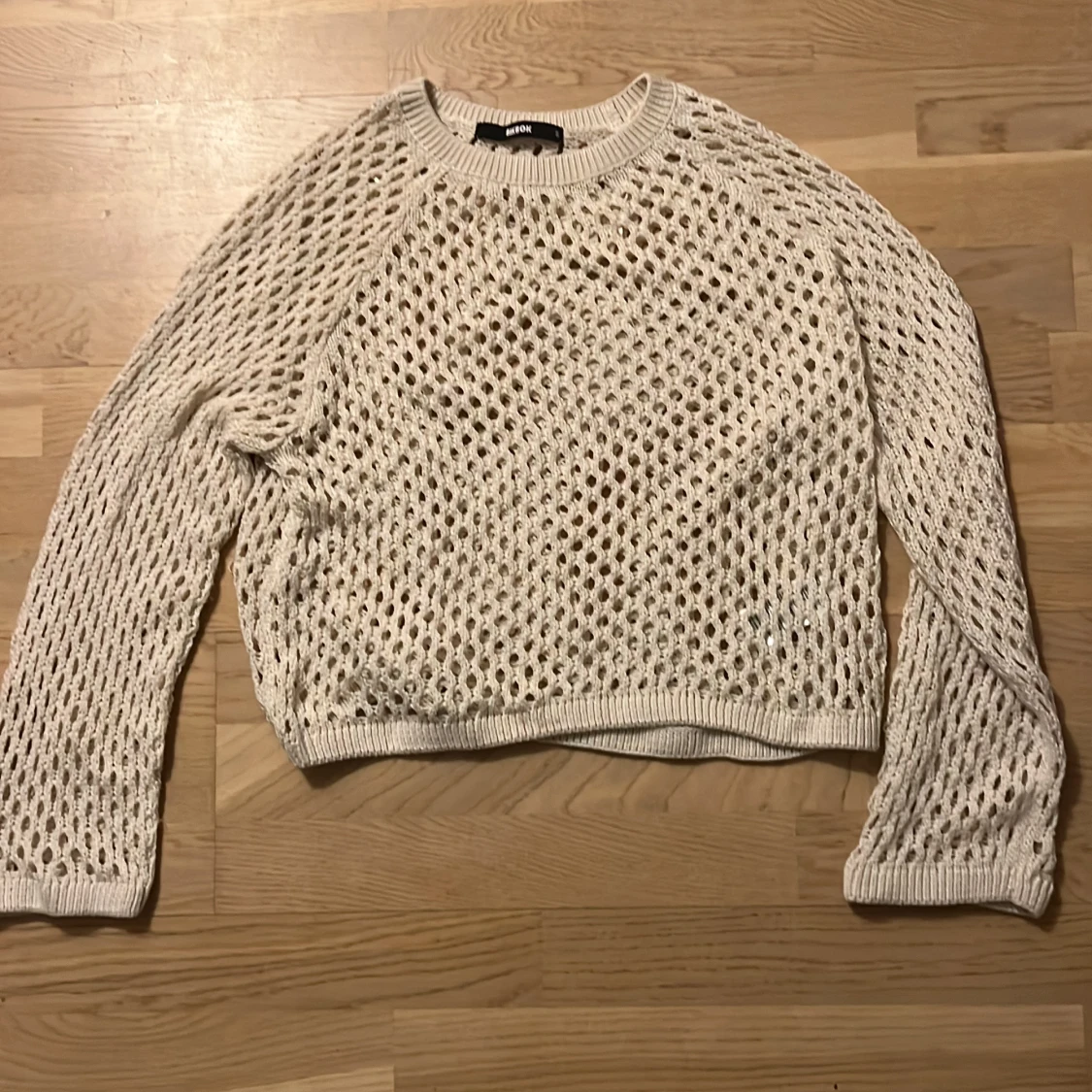Beige stickad tröja från BikBok