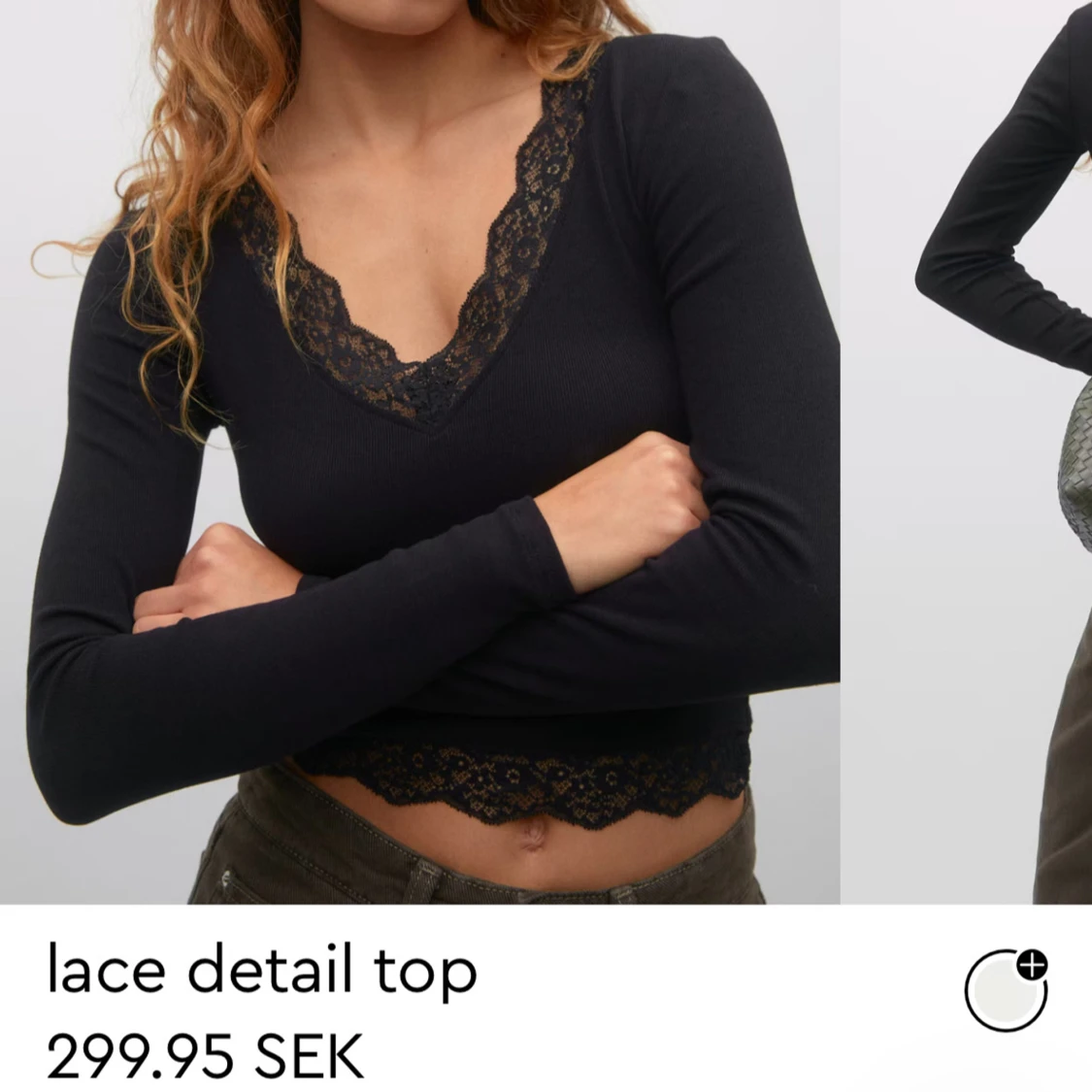 Svart topp med spetsdetaljer från Gina Tricot