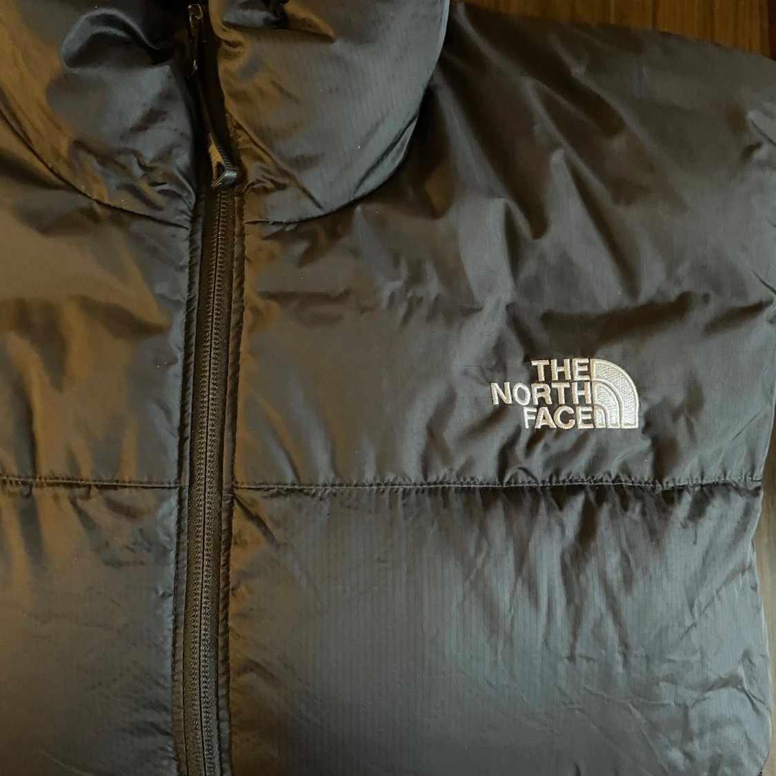 Svart dunjacka från The North Face - 91