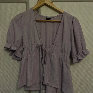 Blus gina tricot - Aldrig använd